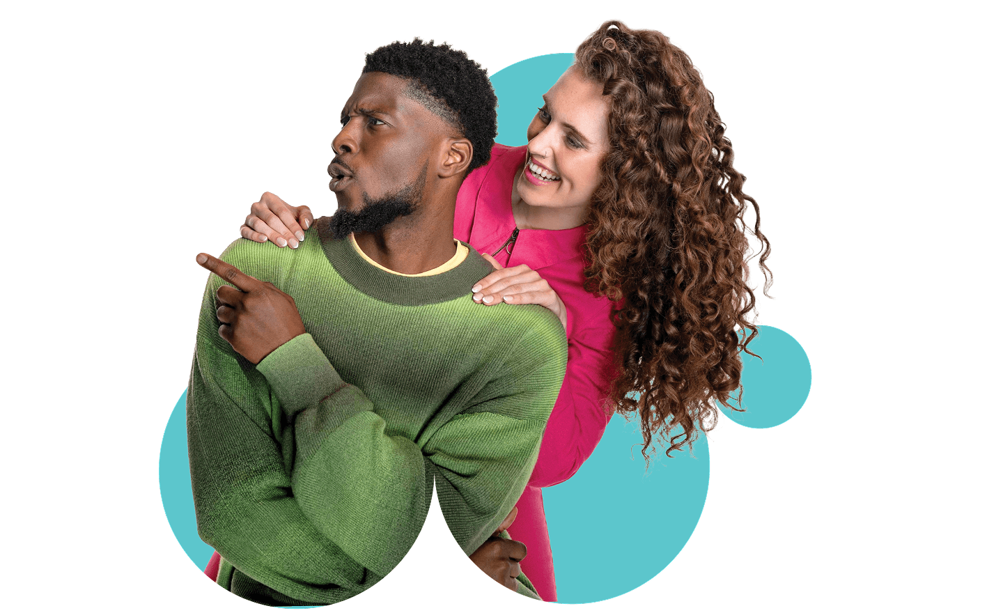 An image of a girl and boy looking to the left and smiling